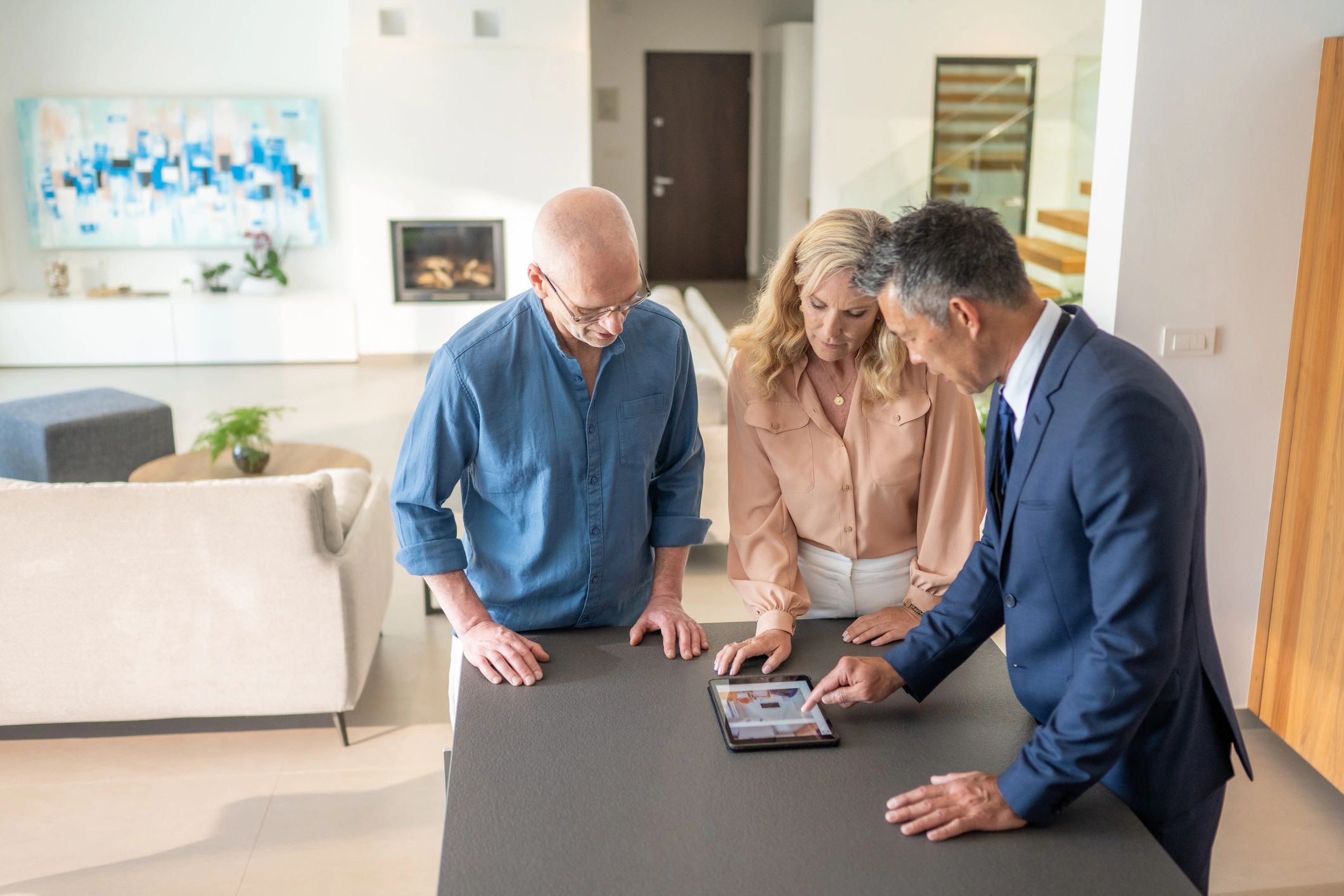 Medical professional speaking with an older couple