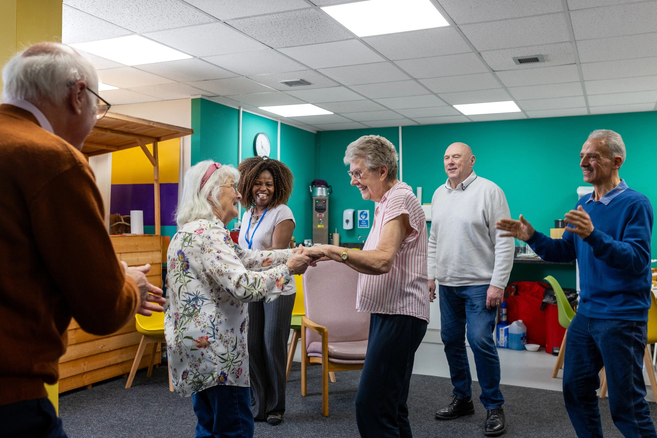 Older adults enjoying a lively community gathering