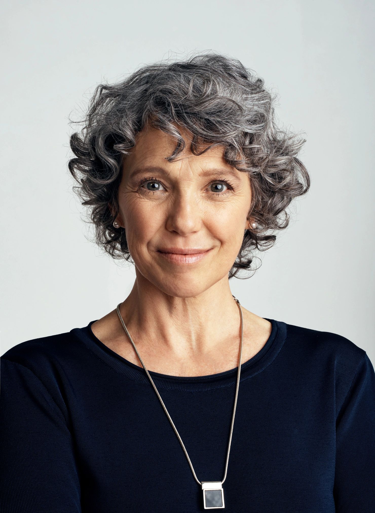Studio portrait of a confident mature woman